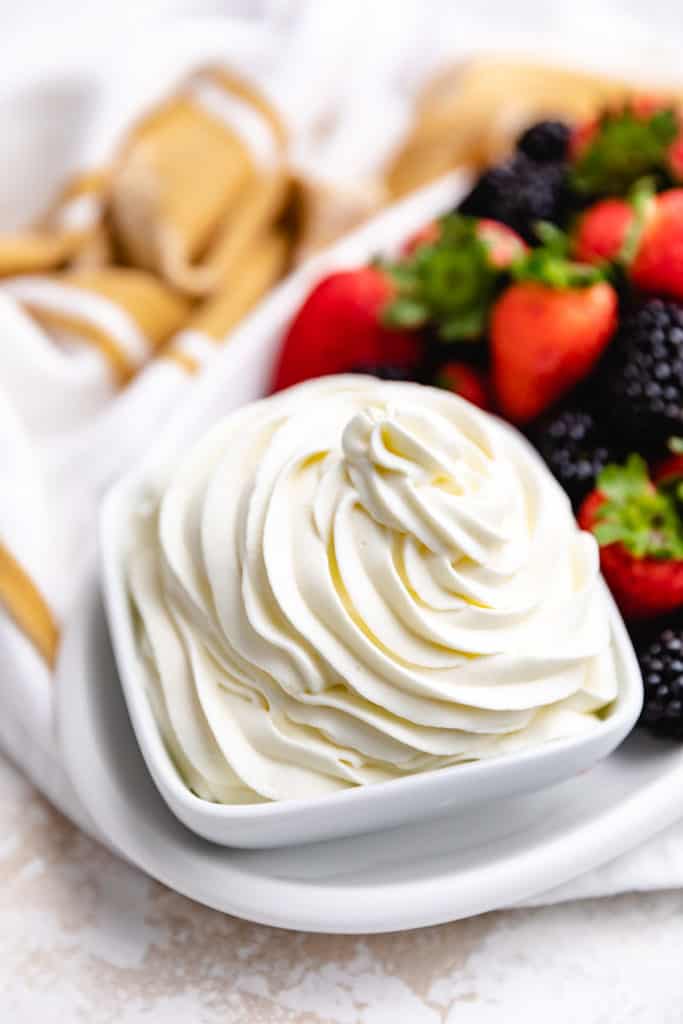Whipped cream with mascarpone in a dish.