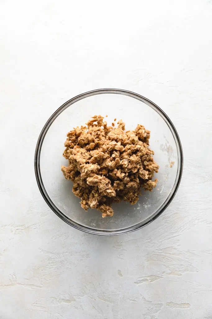 Top down view of crumble topping in a bowl.