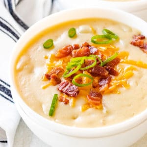 Close up view of loaded potato cheese soup.