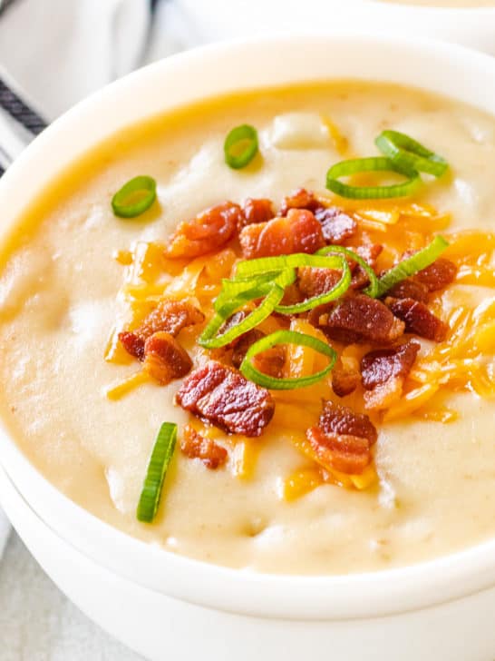 Close up view of loaded potato cheese soup.