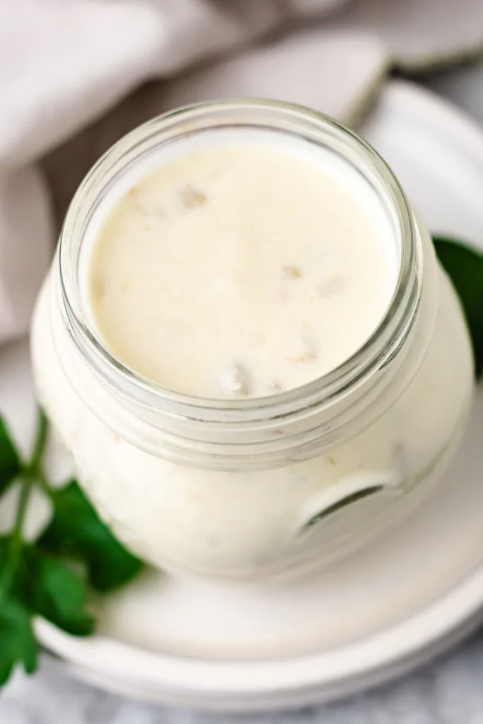 Sour cream sauce for enchiladas in a jar.