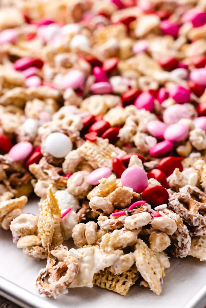 Vanilla candy melts stirred into snack mix.