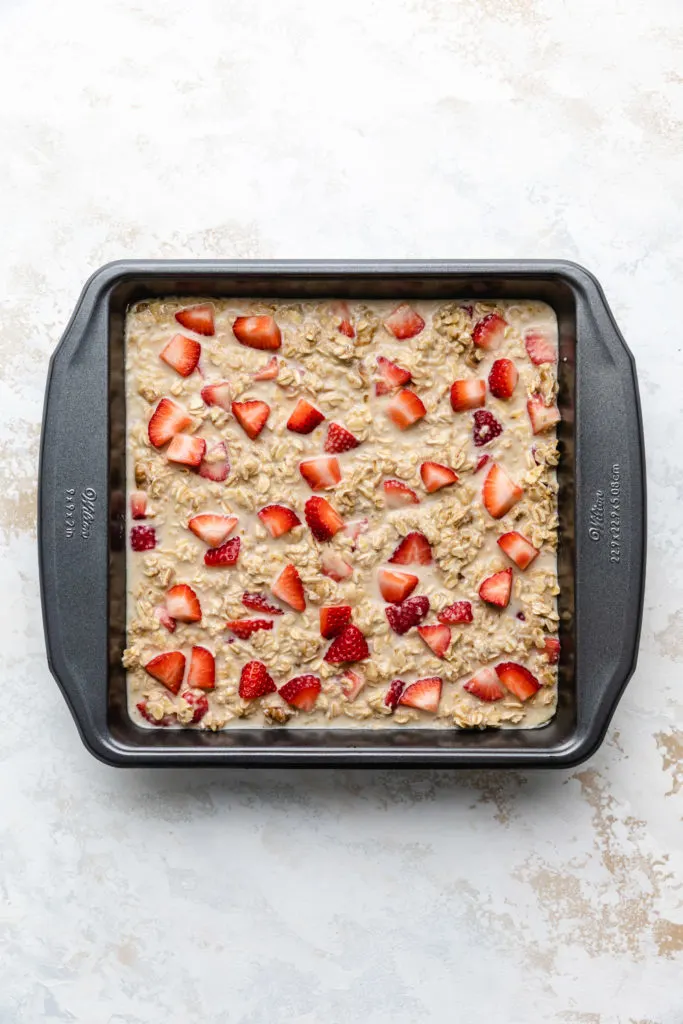 Pan of unbaked strawberry oatmeal.