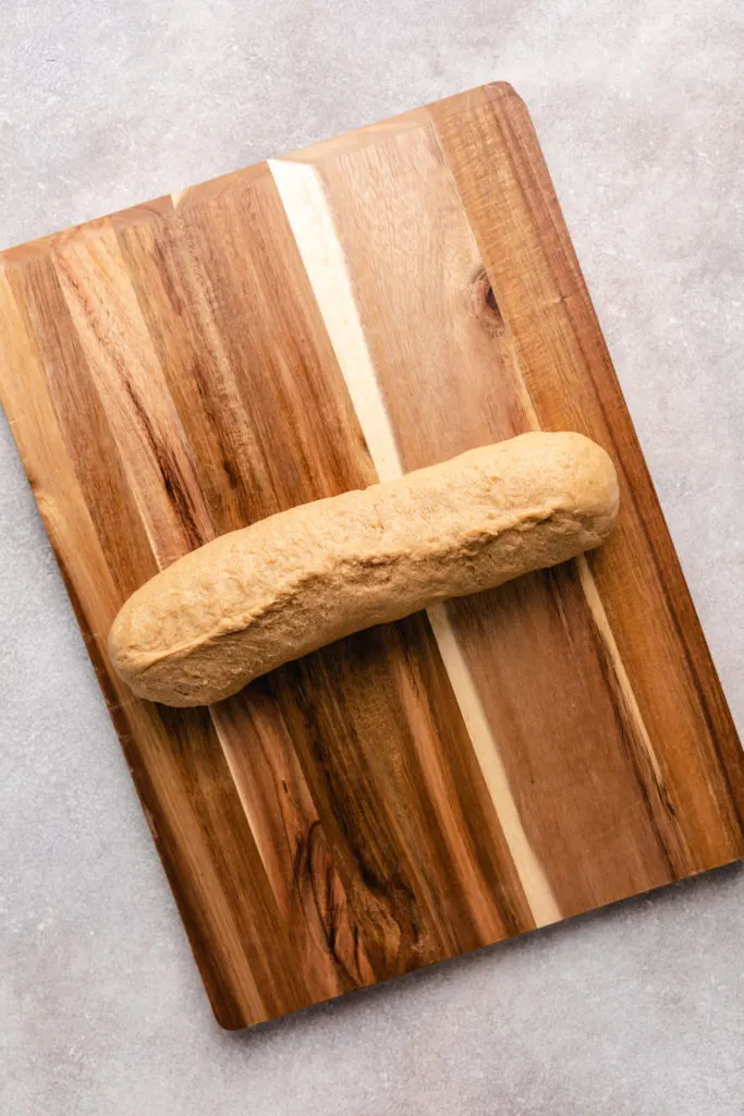 Dough formed into a sealed log.