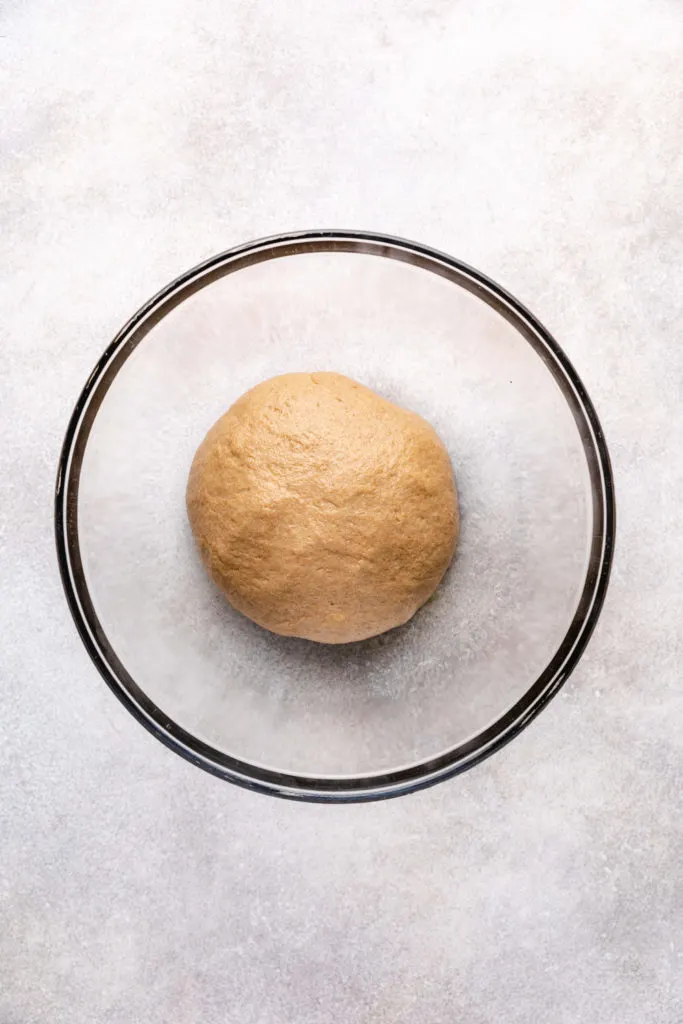 Bread dough in a greased bowl.