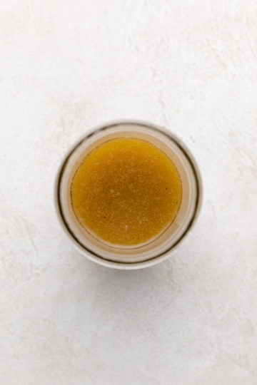 Lemon honey vinaigrette in a jar.