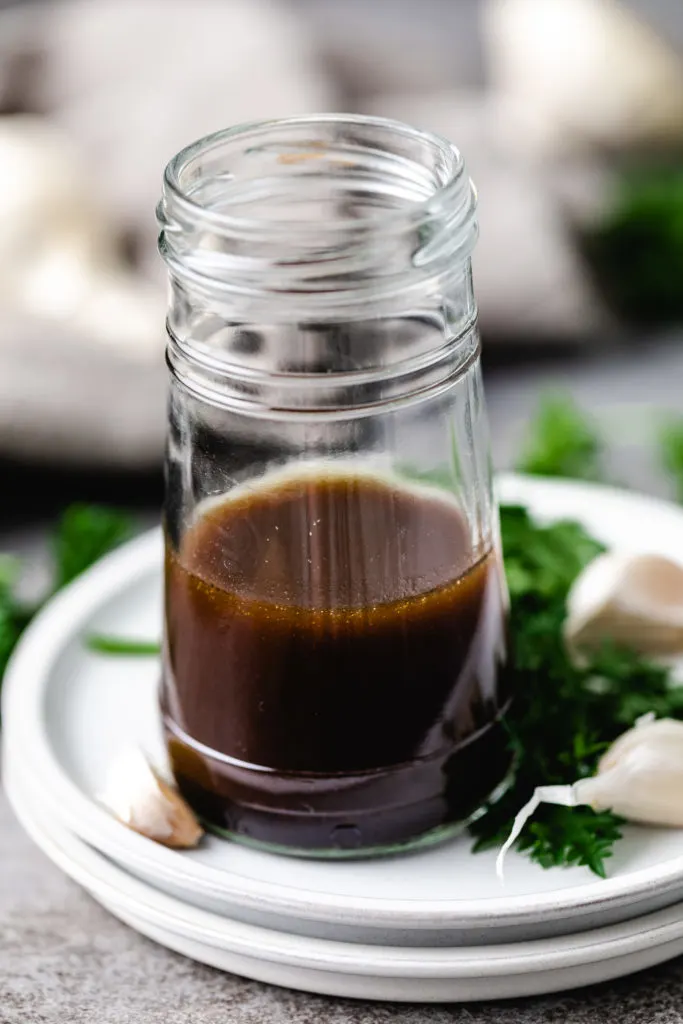 Close up view of salad dressing in a jar.