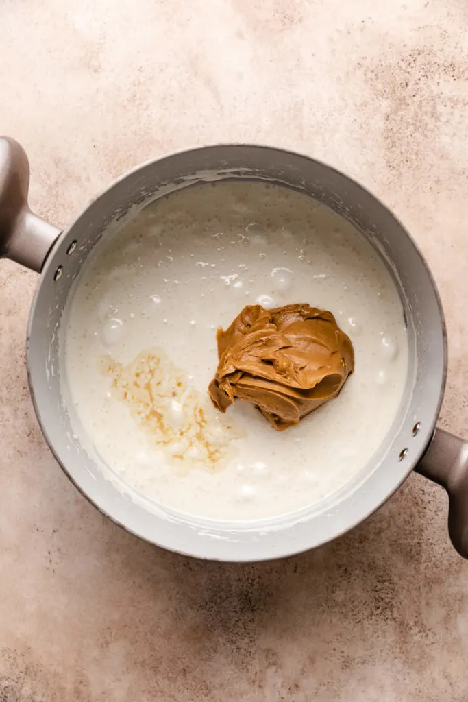 Peanut butter and vanilla added to melted marshmallows.