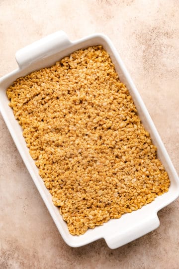 Peanut butter rice krispie treats in a pan.