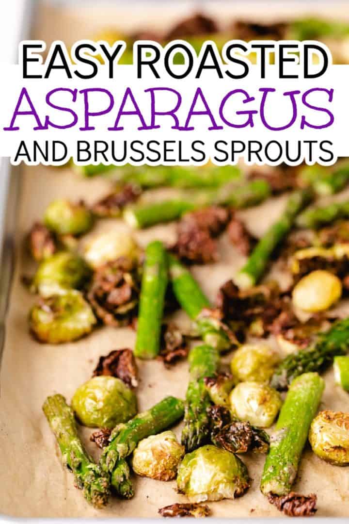 Side view of asparagus and brussels sprouts on a baking sheet.