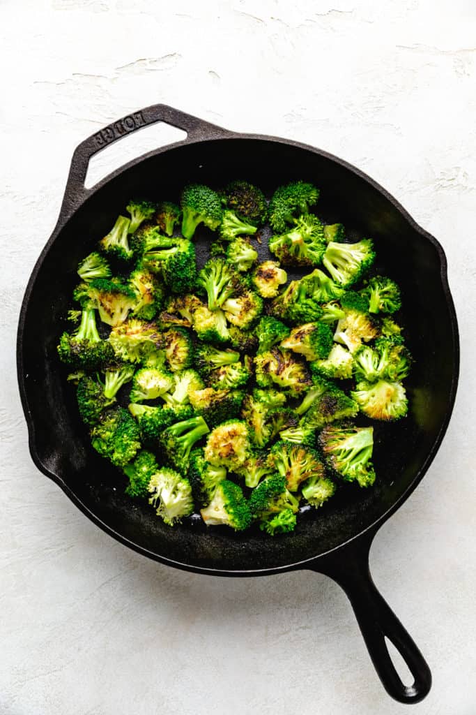 Sauteed broccoli in cast iron.