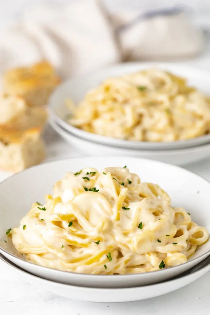 Cheesy garlic parmesan sauce on linguine.