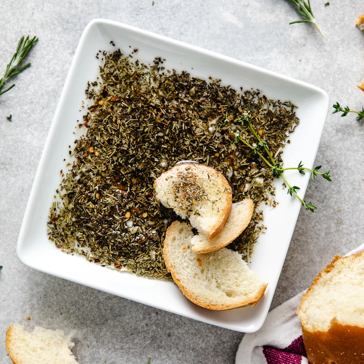 Top down view of bread dipping oil.