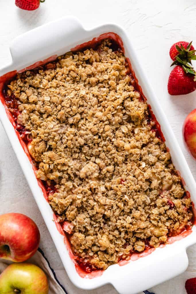 Top down view of freshly baked fruit crisp with crumble topping.