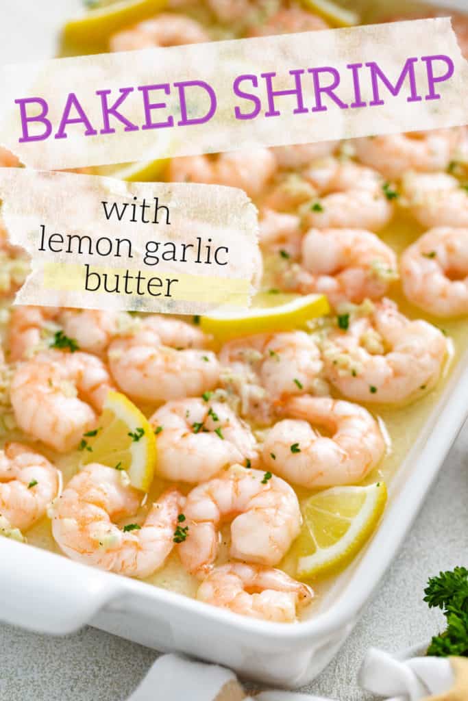 Side view of shrimp in a pan with lemon wedges.