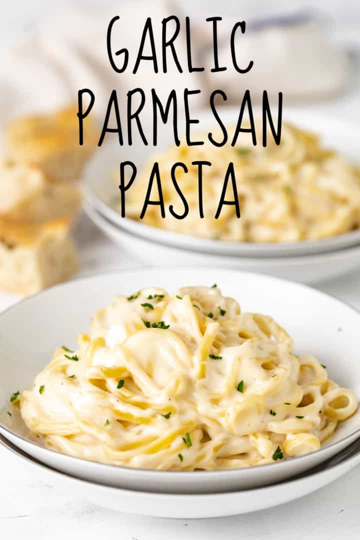 Plate of creamy pasta with parsley.