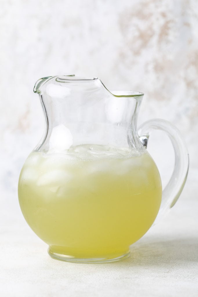 Pitcher of lemonade with basil.