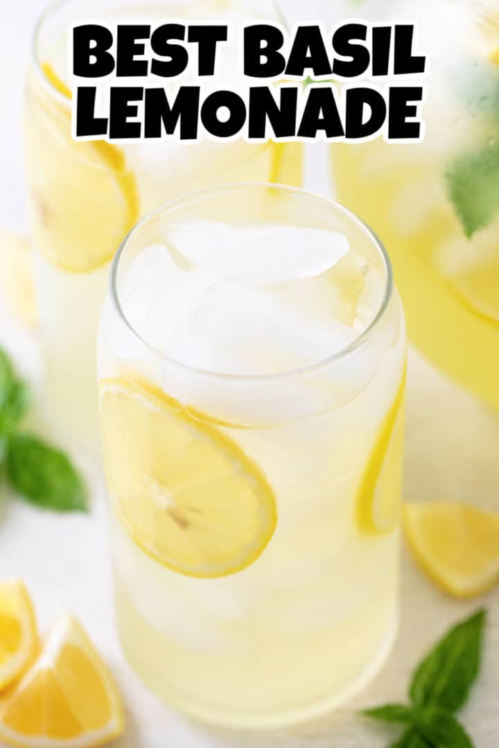 Tall glass of lemonade with basil.