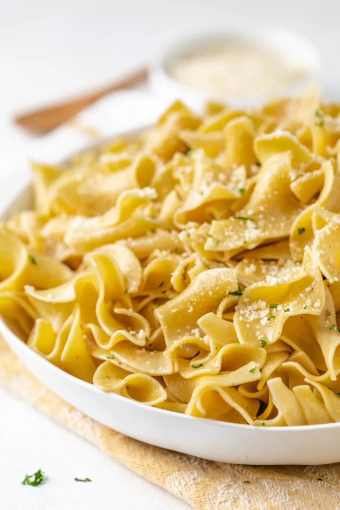 Buttery parmesan pasta in a bowl.