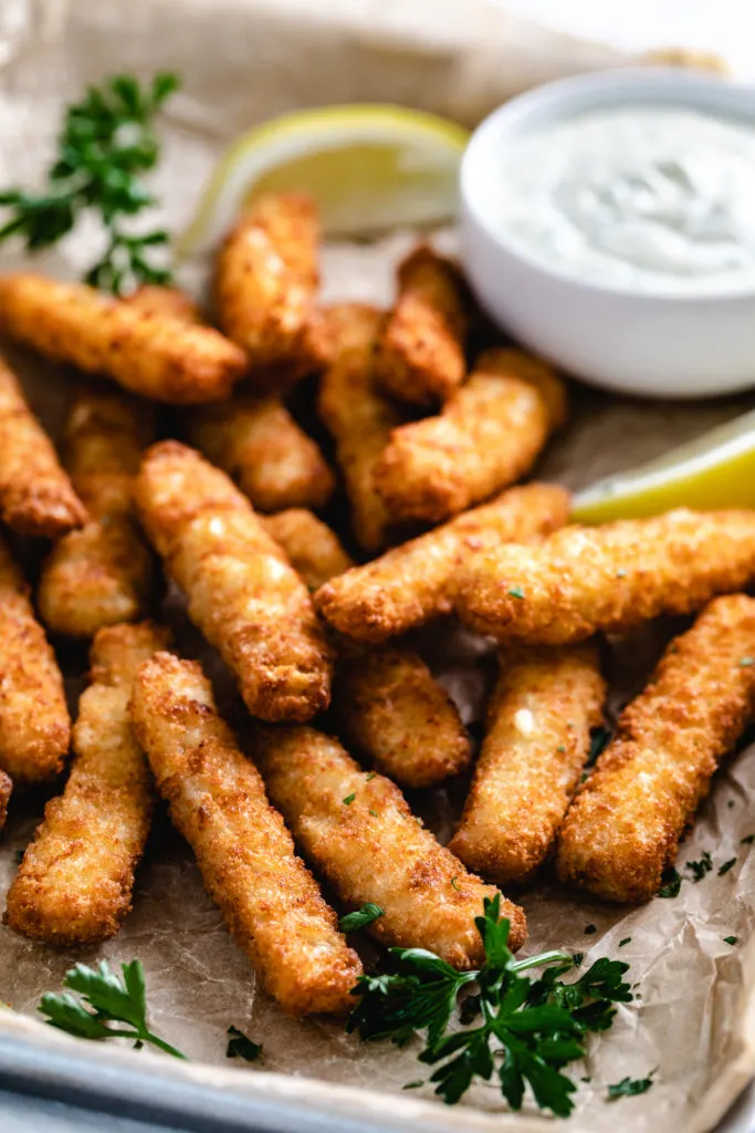 Pan of fish sticks made in the air fryer.