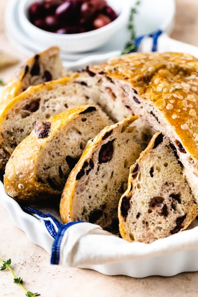 Close up view of a sliced loaf of bread.