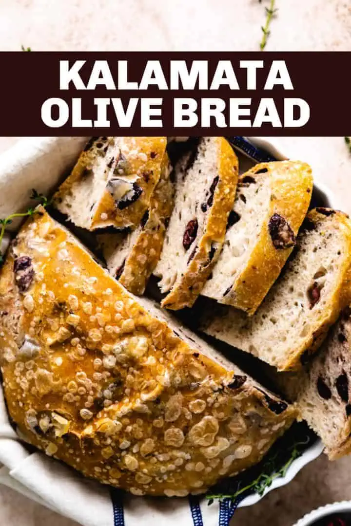 Sliced olive loaf sitting in a plate.