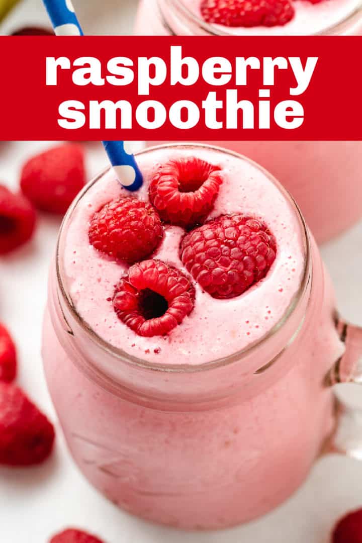 Four raspberries on top of a smoothie.