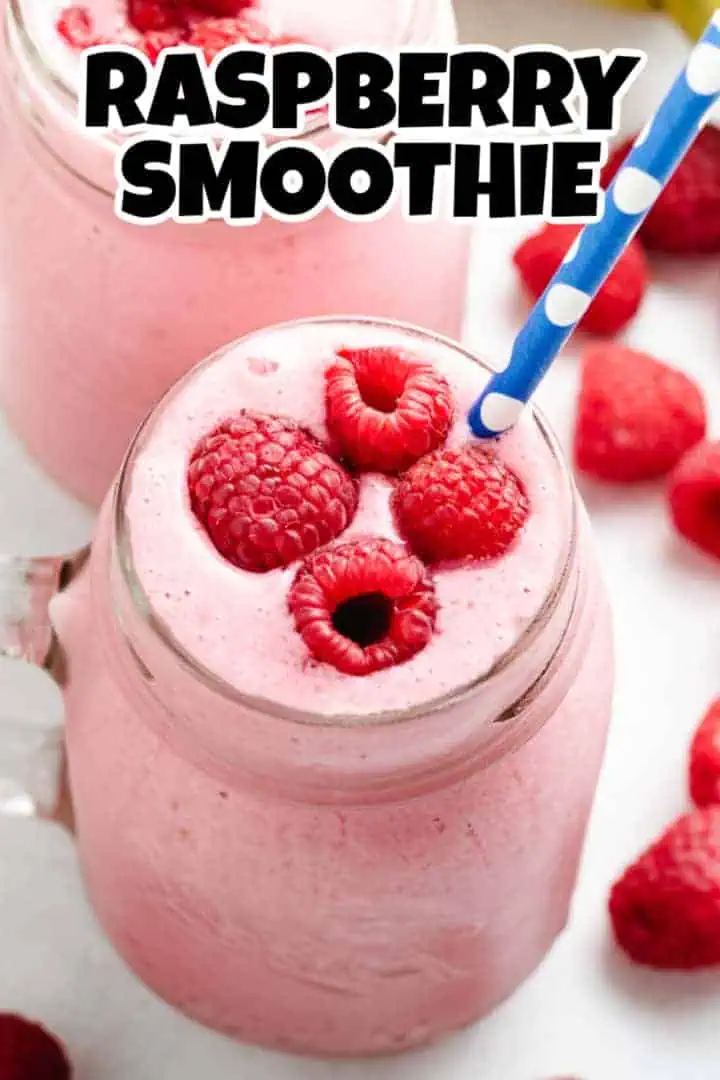 Fresh raspberries on a raspberry smoothie.