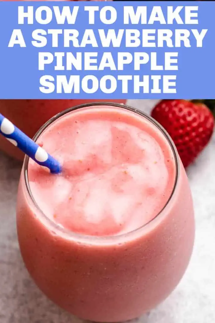 Top down view of a pink smoothie in a glass.