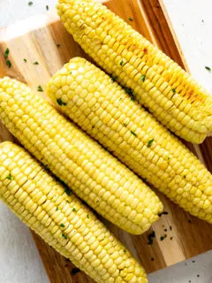 Close up view of freshly baked corn on the cob.