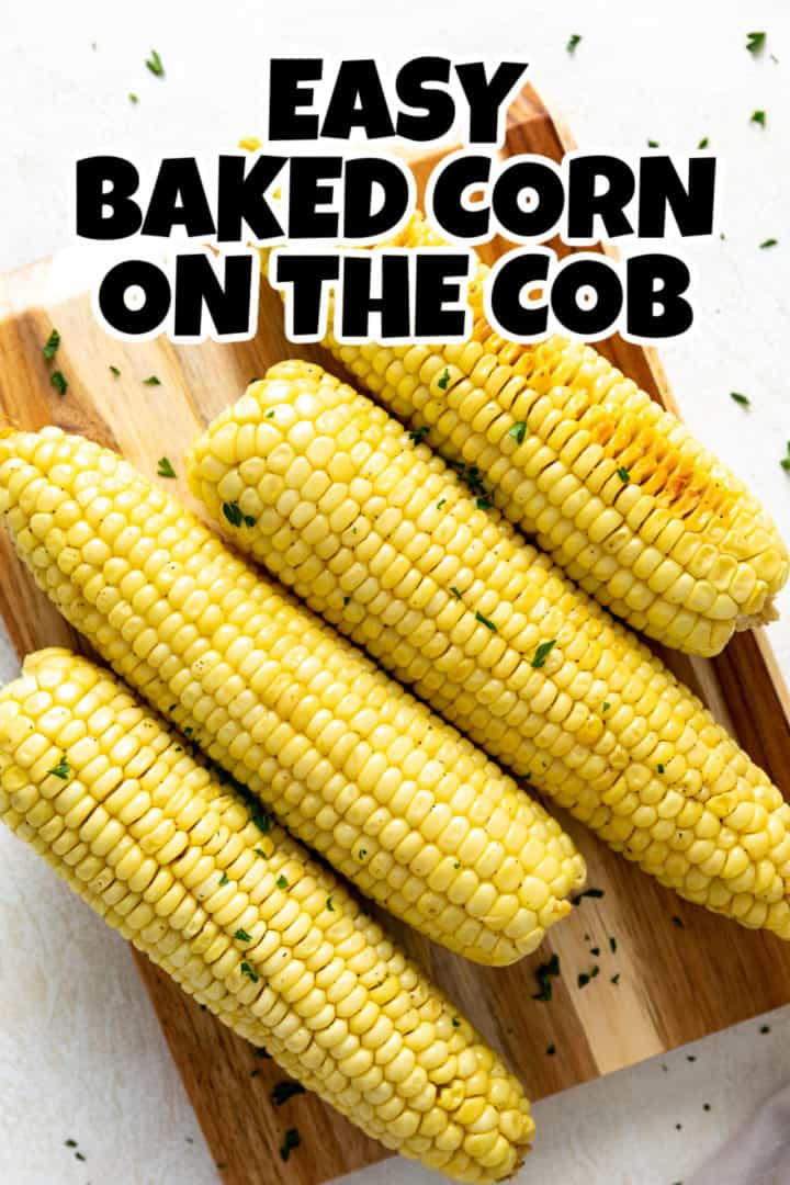 Baked corn on a cutting board.