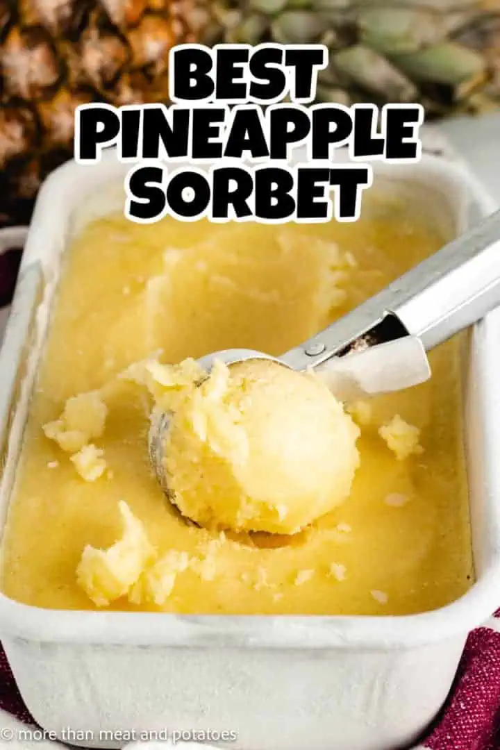 Sorbet being scooped out of a pan.