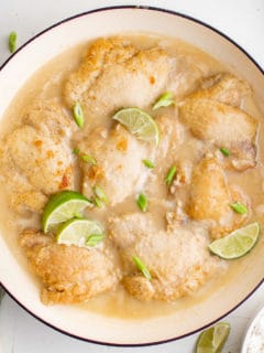 Close up view of a pan of coconut lime chicken.