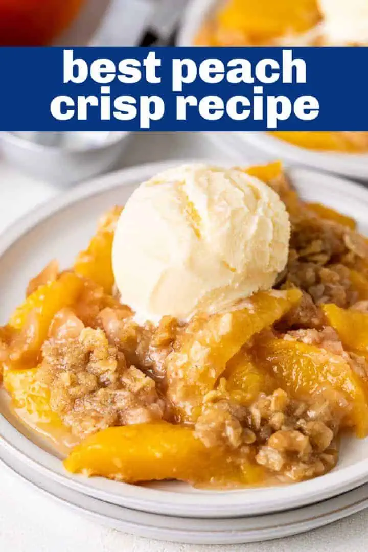 Close up view of fruit crisp on a stack of plates.