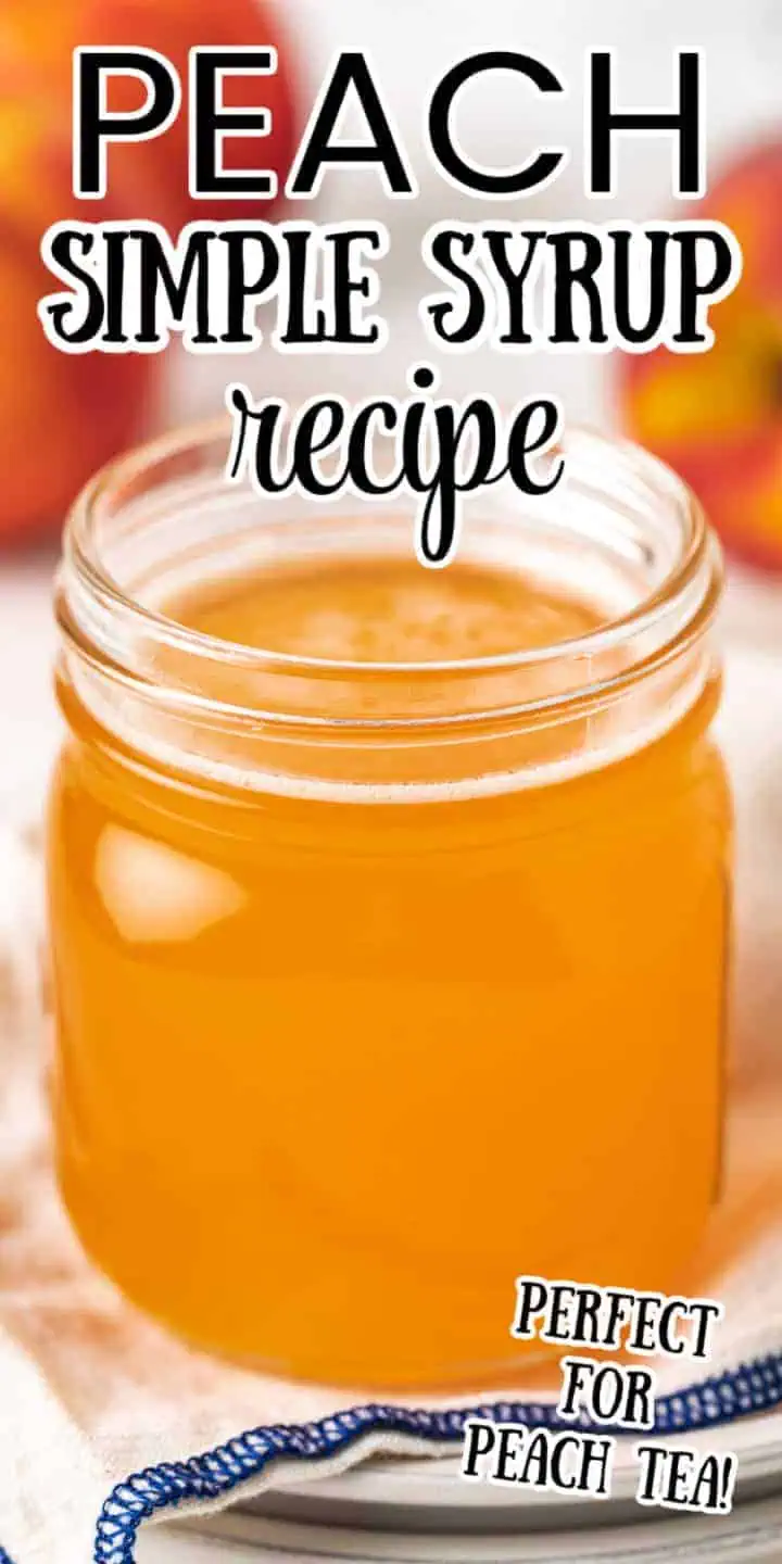 Close up view of a jar of peach syrup.