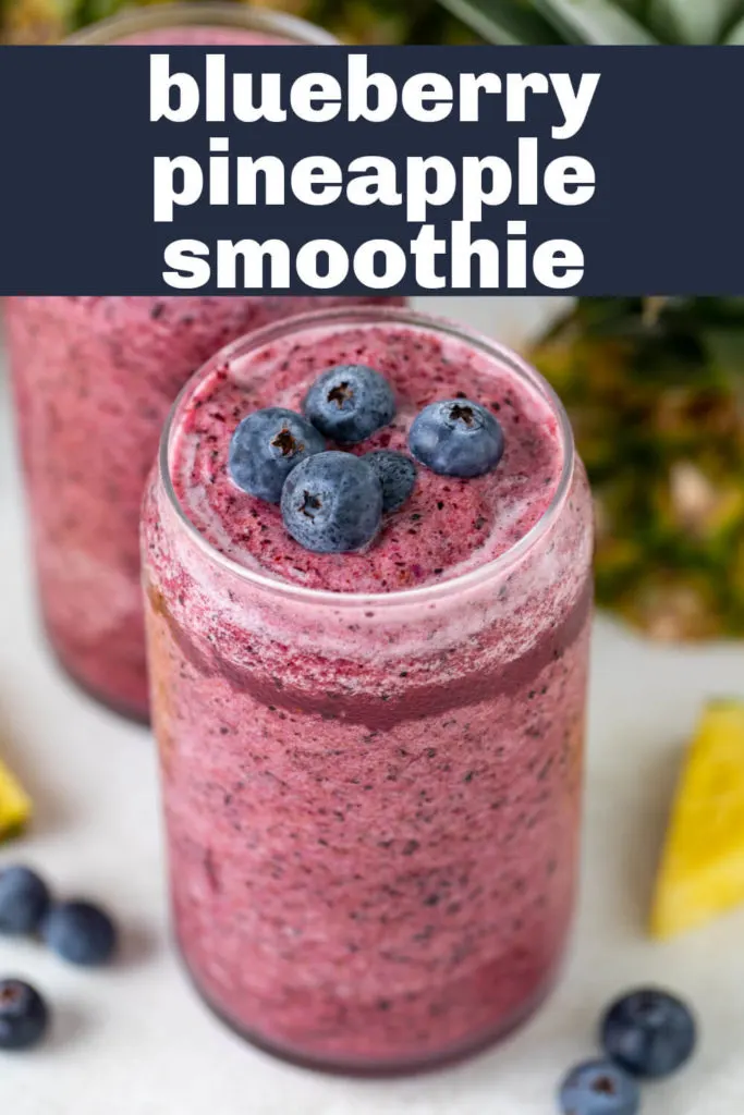 Blueberries on top of a smoothie.