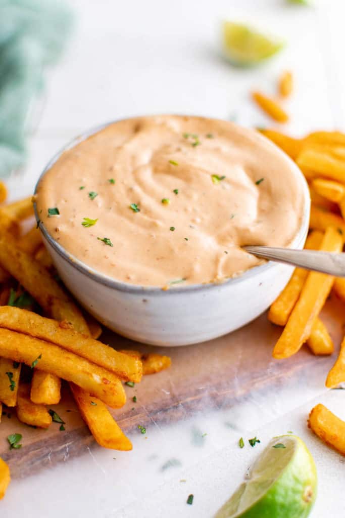 Bowl of chipotle mayo with a spoon.