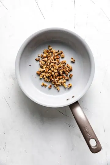 Walnuts in a skillet.