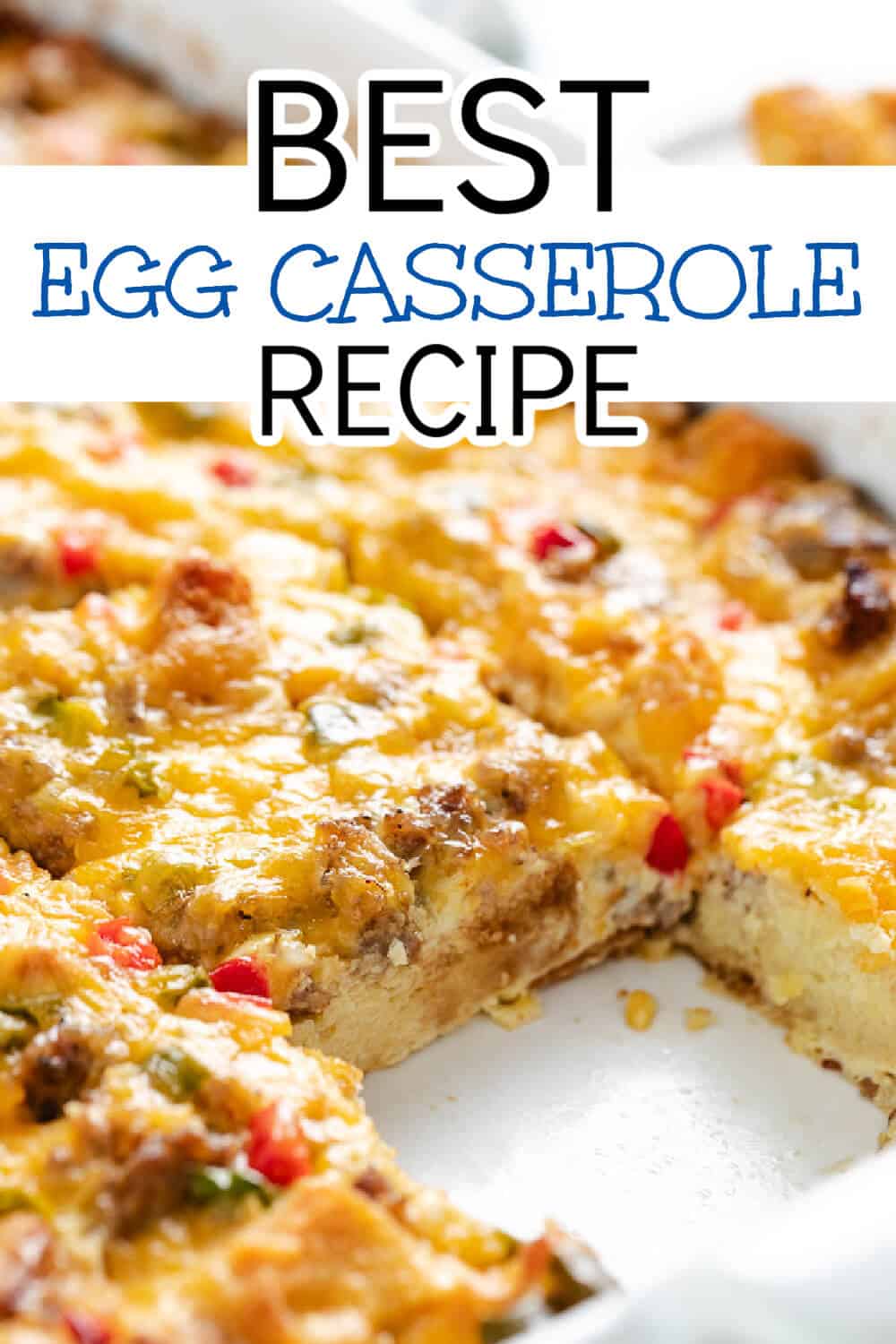 White dish filled with breakfast casserole with sausage.