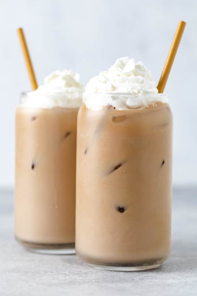 Two iced blonde vanilla lattes in can glasses.