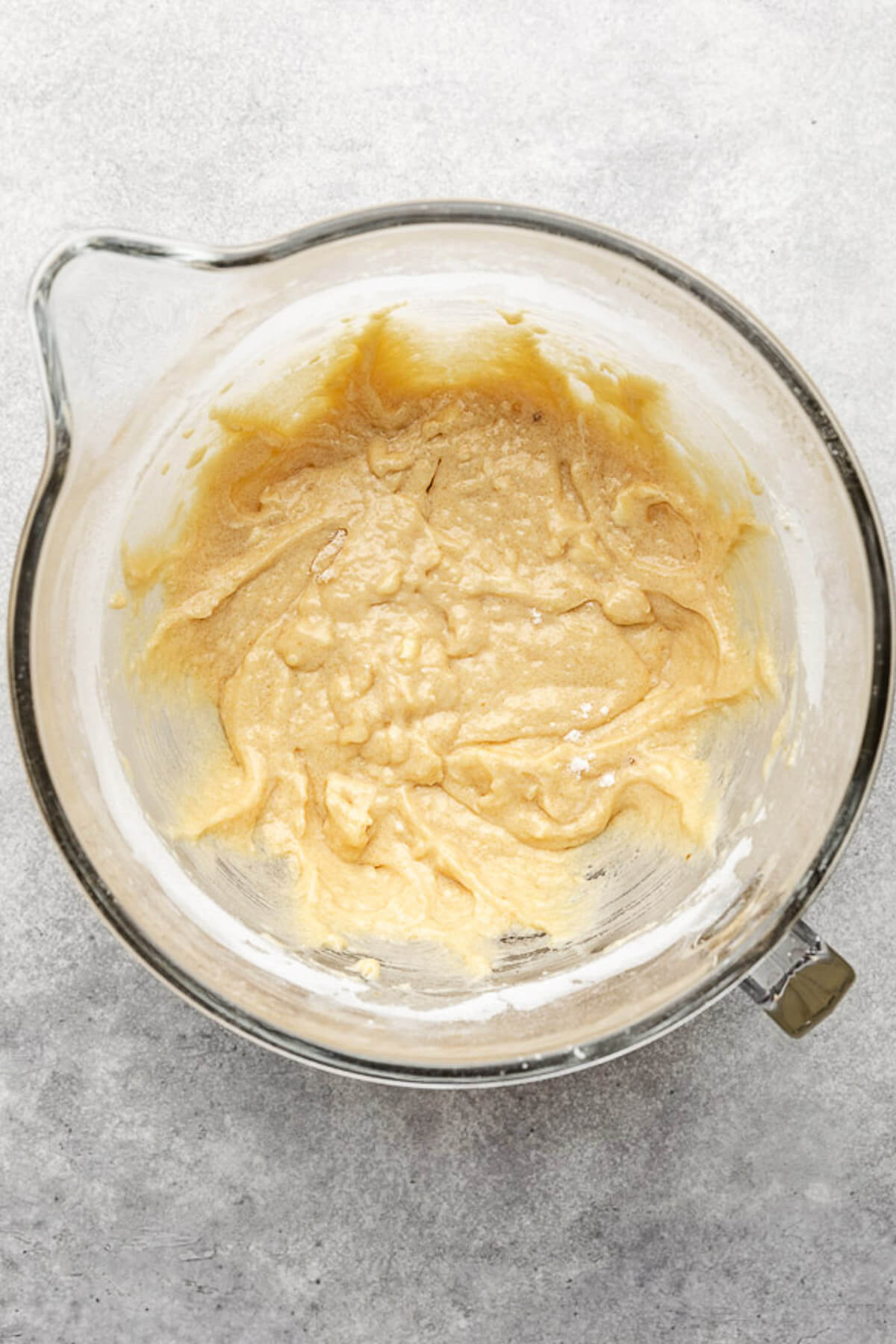 Muffin batter in a glass bowl.