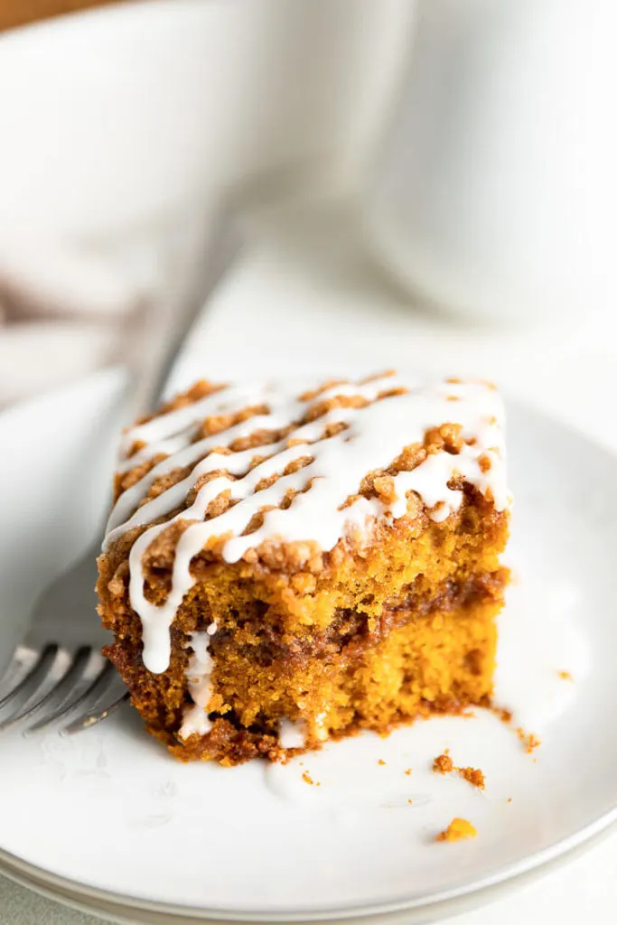 Slice of cake on a white plate.