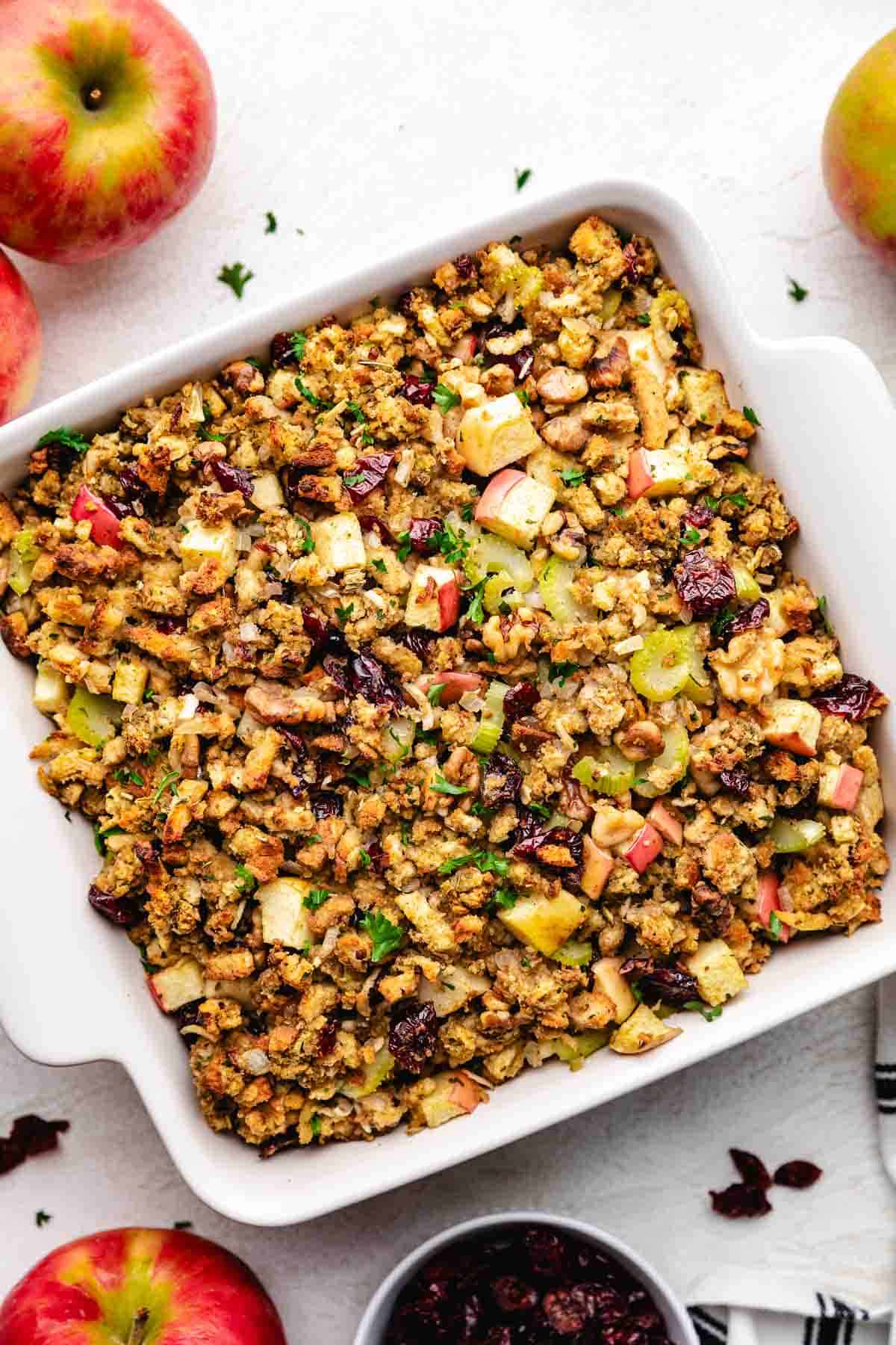 Top down of apple cranberry walnut stuffing in a pan.