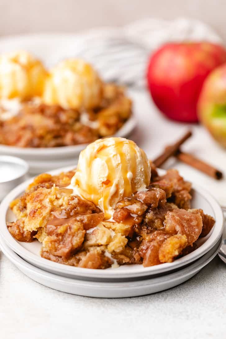 Plates of dump cake with apples.