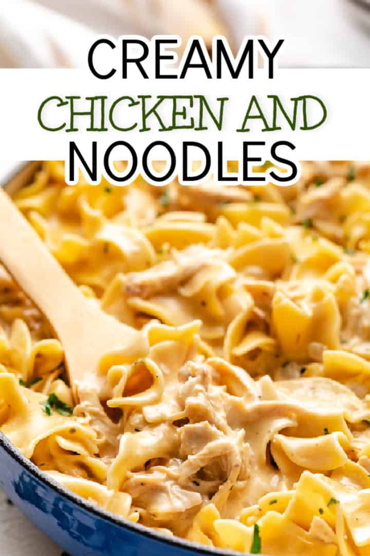 Wooden spoon in a pan of creamy noodles with rotisserie.
