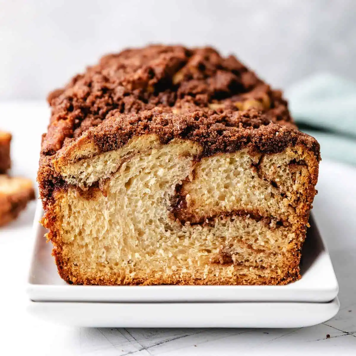 Close up view of cinnamon swirl through a loaf of bread.