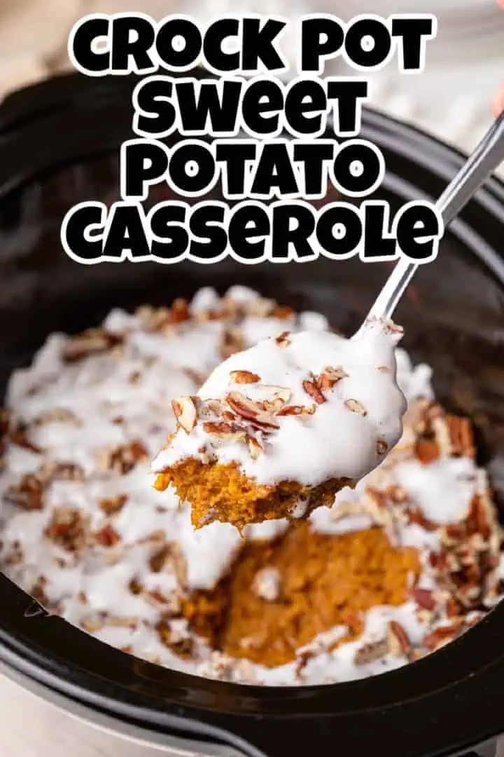 Spoon holding up a scoop of sweet potato casserole.