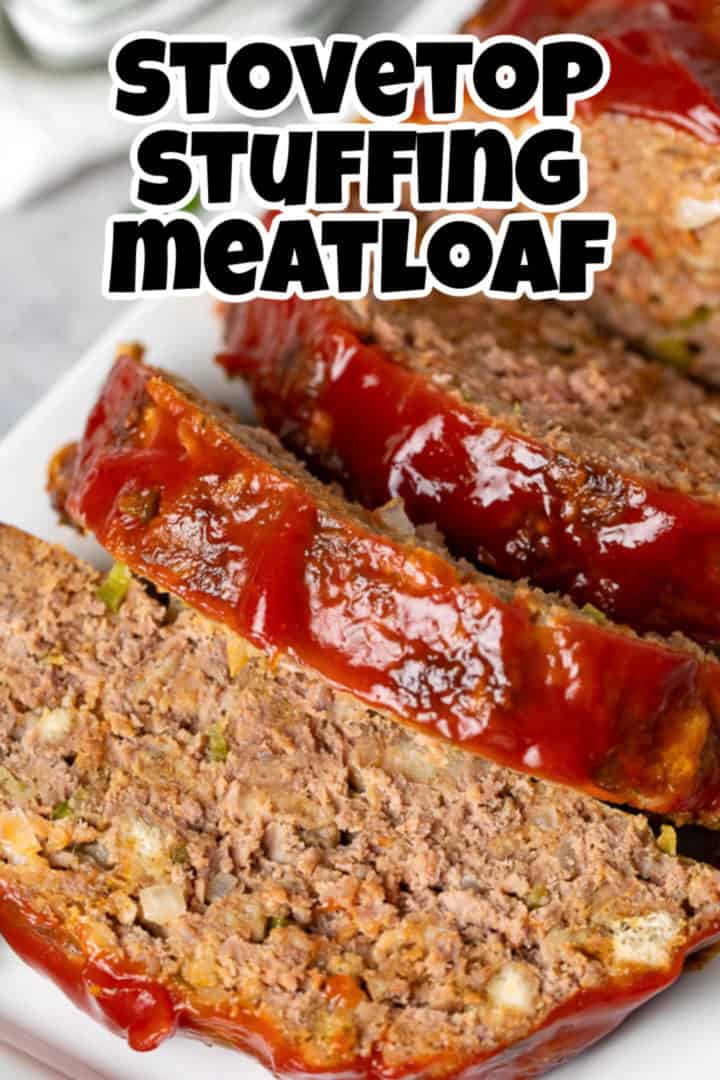 Close up view of sliced meatloaf with ketchup.