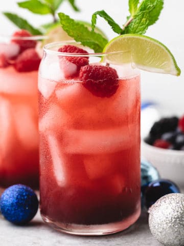 Close up view of a holiday drink in a tall glass.