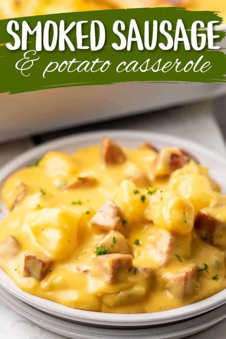Plate of cheesy potatoes with sausage.
